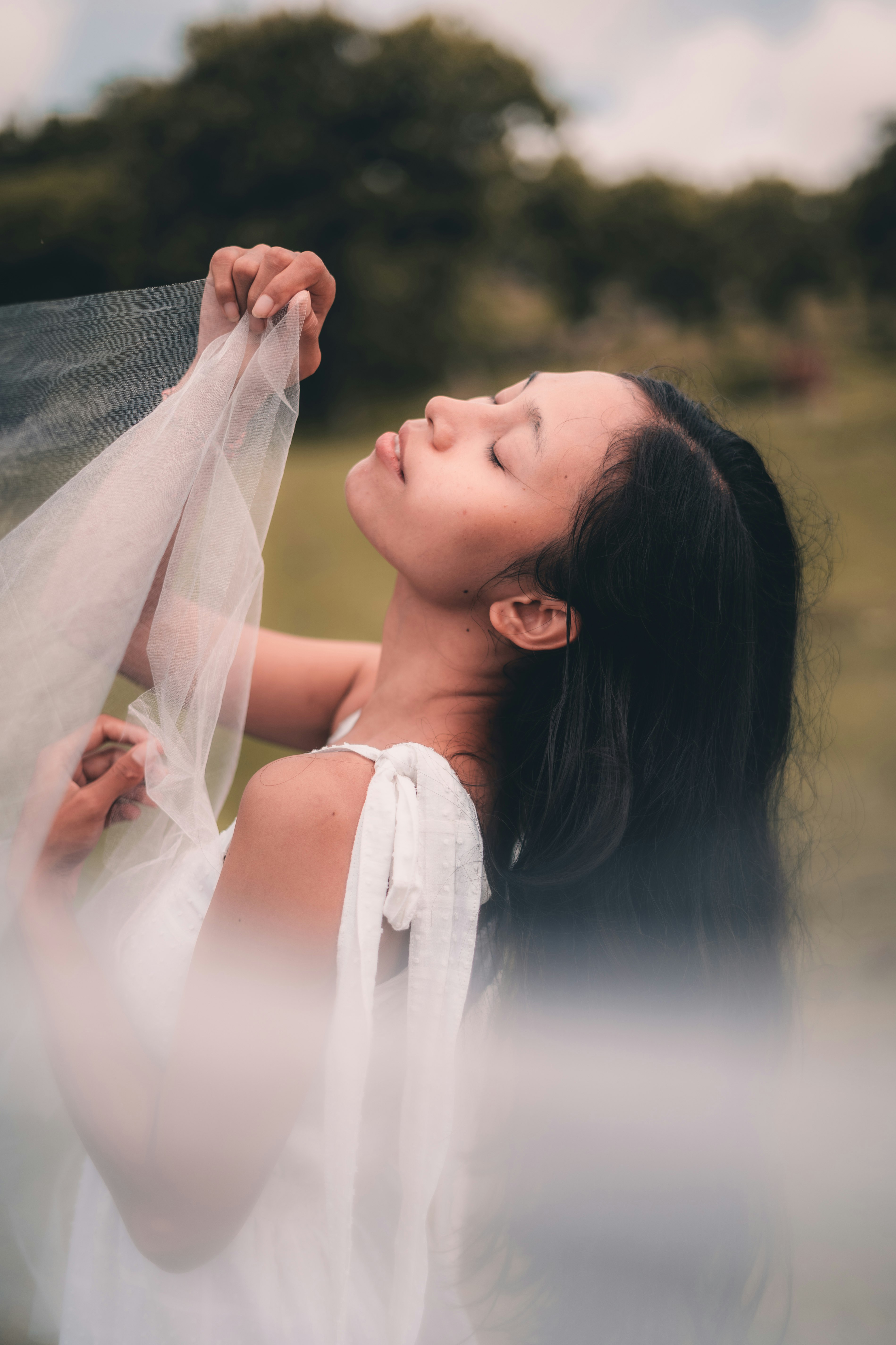 woman in white sleeveless dress